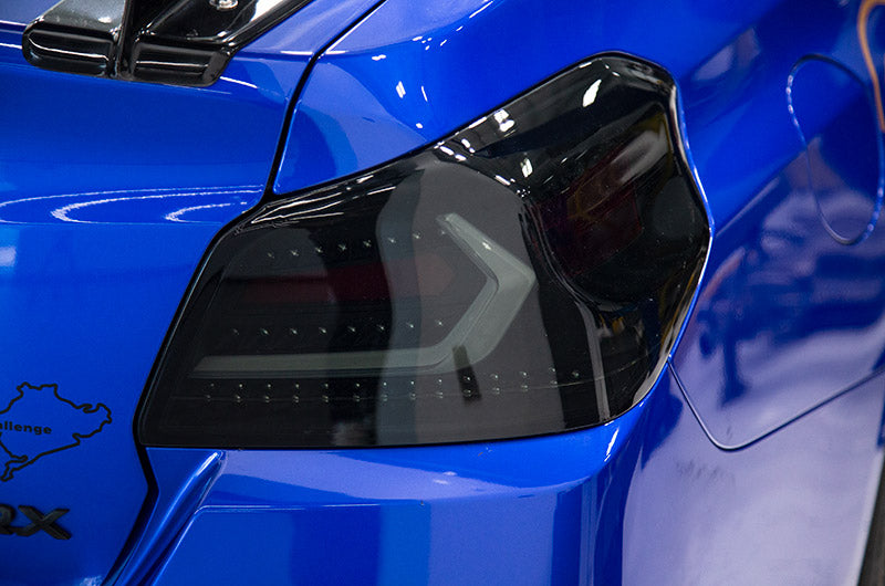 OLM エボリューションテールライト(スモークレンズ・ブラックベース・ホワイトバー) - 2015-2021 WRX / STI