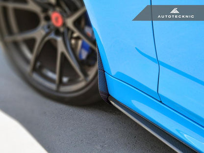 AutoTecknic F90 M5 Carbon Fiber Splash Guard installed at rear of driver side front wheel well