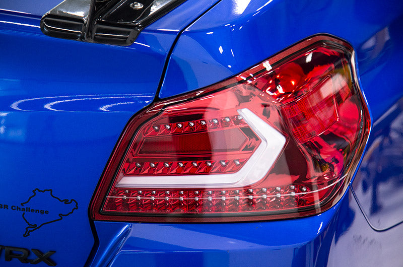 OLM Evolutionテールライト - クリアレンズ・レッドベース・ホワイトバー - 2015-2021 スバル WRX/STI用