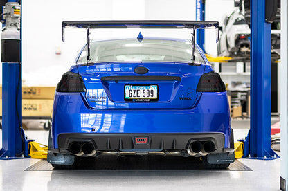OLM エボリューション テールライト（スモークレンズ、ブラックベース、レッドバー）- 2015-2021 WRX / STI