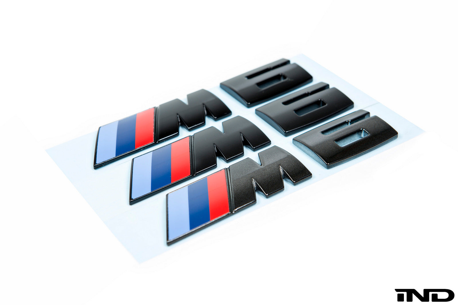 iND f06 f12 f13 m6 painted trunk emblem - iND Distribution