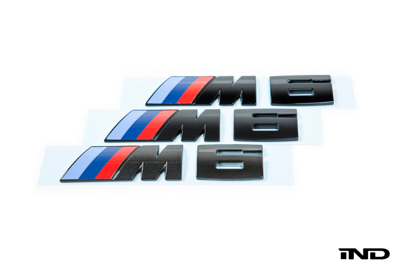 iND f06 f12 f13 m6 painted trunk emblem - iND Distribution