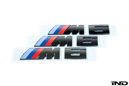 iND f06 f12 f13 m6 painted trunk emblem - iND Distribution