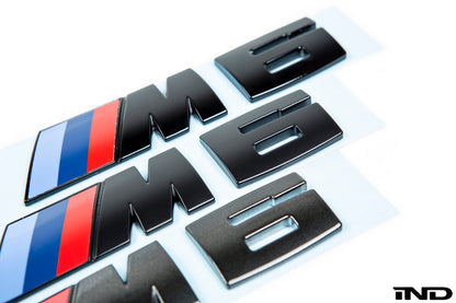 iND f06 f12 f13 m6 painted trunk emblem - iND Distribution