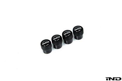 iND logo black valve stem cap set - iND Distribution